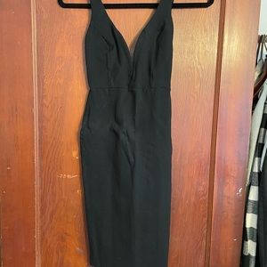 Black curve hugging dress; worn once.